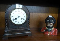 AN EARLY TWENTIETH CENTURY DARK STAINED OAK CASED MANTEL CLOCK, WITH FRENCH MOVEMENT, 9" (23cm) high