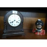 AN EARLY TWENTIETH CENTURY DARK STAINED OAK CASED MANTEL CLOCK, WITH FRENCH MOVEMENT, 9" (23cm) high