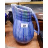 A BESWICK POTTERY ART DECO WATER JUG WITH BLUE RUNNING GLAZE