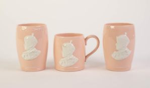 PAIR OF JOHNSON BROTHERS ROYAL COMMEMORATIVE PINK POTTERY BEAKERS, 1937, each applied in white