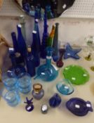 A COLLECTION OF BLUE GLASS WARE, INCLUDING A DECANTER, BOTTLES, ETC., APPROXIMATELY 30 PIECES