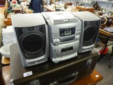 HITACHI MODEL CX 310 COMPACT FM RADIO, CASSETTE RECORDER AND CD PLAYER, WITH TWO LOUDSPEAKERS