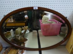 A LARGE OVAL BEVELLED EDGE WALL MIRROR, IN MAHOGANY FRAME, WITH BOX WOOD STRING INLAY, 2?8? WIDE