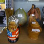 A SET OF RUSSIAN WOODEN NESTING DOLLS; A TURNED WOOD CIRCULAR TOBACCO JAR AND COVER; A COLD