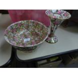 AN INTER-WAR YEARS CROWN DUCAL POTTERY BOWL AND AN ANYSLEY FLOWER RECEIVER WITH LOOSE PIERCED