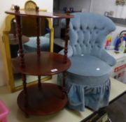 A MAHOGANY OFFICE CIRCULAR THREE TIER WHAT-NOT AND A BOUDOIR BUTTONED BACK EASY CHAIR, ON TURNED