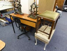 A METAL FRAMED TEAK SIDE TABLE WITH TWO DRAWERS, AN OFFICE REVOLVING CHAIR AND A DRESSING STOOL