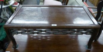 CHINESE HARDWOOD OBLONG COFFEE TABLE, WITH RAISED BORDER, CARVED AND PIERCED SCROLLED APRON, ON