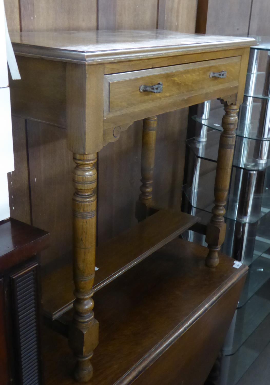 AN OAK OBLONG HALL TABLE WITH ONE LONG DRAWER, ON FOUR BALUSTER LEGS WITH UNDER PLATFORM, 2?6? WIDE