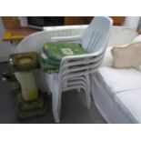 A SET OF FOUR WHITE PLASTIC STACKING GARDEN ARMCHAIRS WITH LOOSE CUSHIONS AND THE LARGE D-END