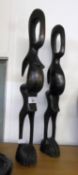 TWO AFRICAN CARVED EBONY STYLISED MALE AND FEMALE FIGURES, 21? HIGH