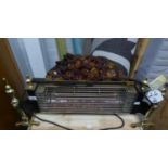 AN ELECTRIC DOG GRATE PATTERN RADIATOR WITH COAL EFFECT, HEARTH FITTING