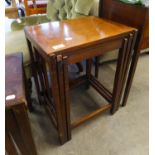 A NEST OF THREE MAHOGANY OBLONG COFFEE TABLES, ON STRAIGHT LEGS WITH BOX STRETCHERS