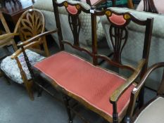 A MAHOGANY FRAMED DRAWING ROOM SETTEE, SEAT COVERED IN RED FABRIC AND INLAY TO THE BACK