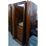 A MODERN MAHOGANY WILLIS AND GAMBIER TRIPLE DOOR WARDROBE, 6'6" HIGH X 5'10" WIDE X 2'2" DIAMETER