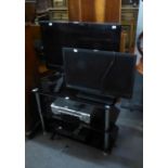 LG FLAT SCREEN TELEVISION, 25?, ON BLACK GLASS THREE-TIER STAND WITH SANYO VIDEO RECORDER AND