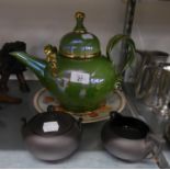 A BLACK BASALT CREAM JUG AND SUCRIER AND COVER, A GREEN GLAZED POTTERY JUMBO TEAPOT AND A BALLOON