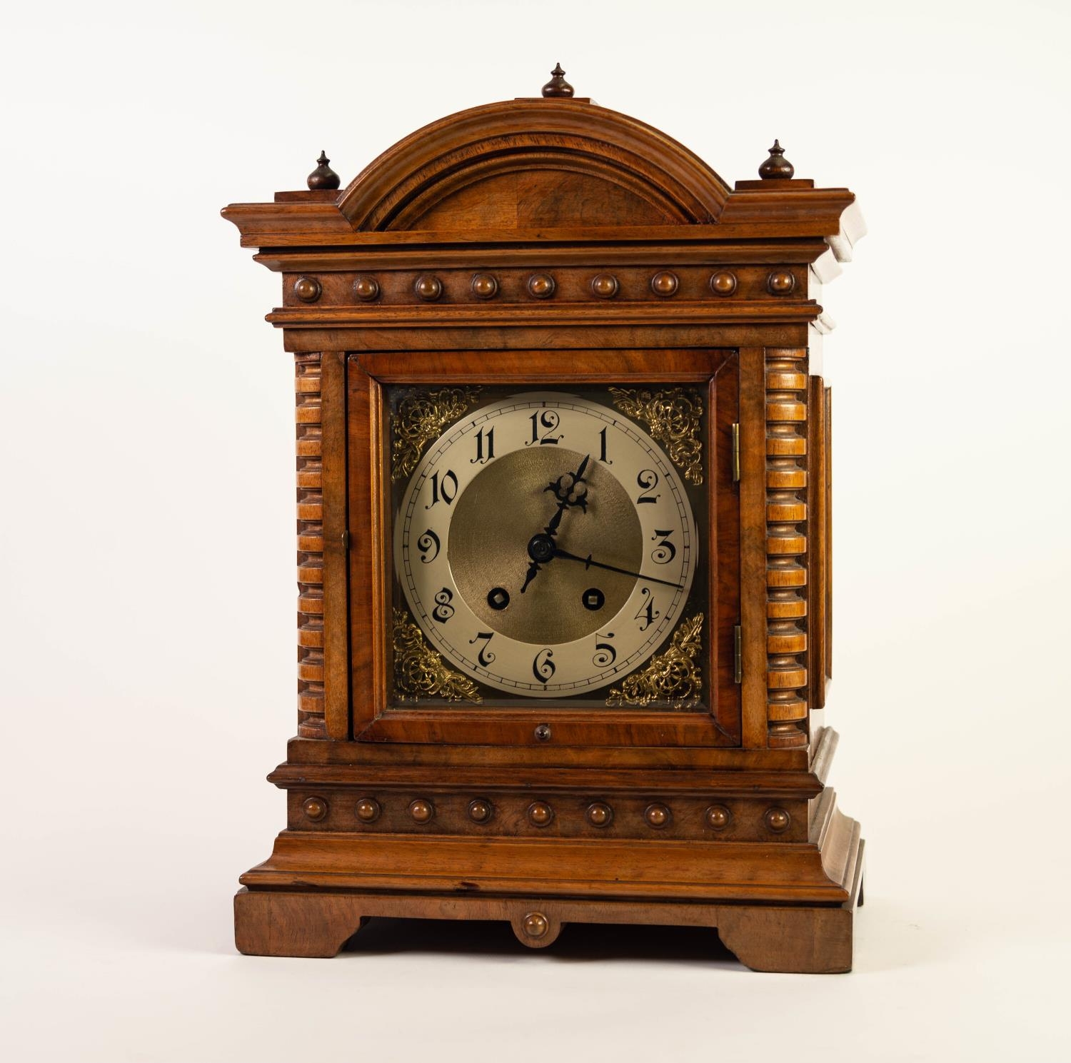 EARLY TWENTIETH CENTURY GERMAN CARVED WALNUT CASED MANTLE CLOCK BY WERNER?S, the 7? Arabic dial with
