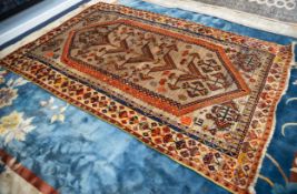 SHIRAZ PERISAN LARGE RUG OF CAUCASIAN STYLE with five wing shaped pole medallions on a brown