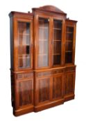 CHARLES BARR, EARLY VICTORIAN STYLE CHERRY AND FLAME CUT MAHOGANY BREAKFRONT LIBRARY BOOKCASE, the