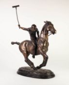 PATINATED SPELTER GROUP OF A MOUNTED POLO PLAYER, modelled with mallet raised, 26 ½? (67.3cm) high