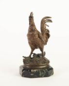 E. DROUOT PATINATED BRONZE MODEL OF COCKEREL, modelled with red glass eyes, on an oval moulded base,