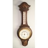 EARLY TWENTIETH CENTURY OAK ANEROID BANJO BAROMETER, the 6 ½? dial housed in a case with removable