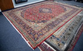 KERMANSHAH PERSIAN CARPET with ivory and dark blue lozenge shaped centre medallion with pendants and