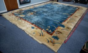 LARGE PRE-WAR HEAVY QUALITY WASHED CHINESE EMBOSSED CARPET, with a plain sky blue field with large