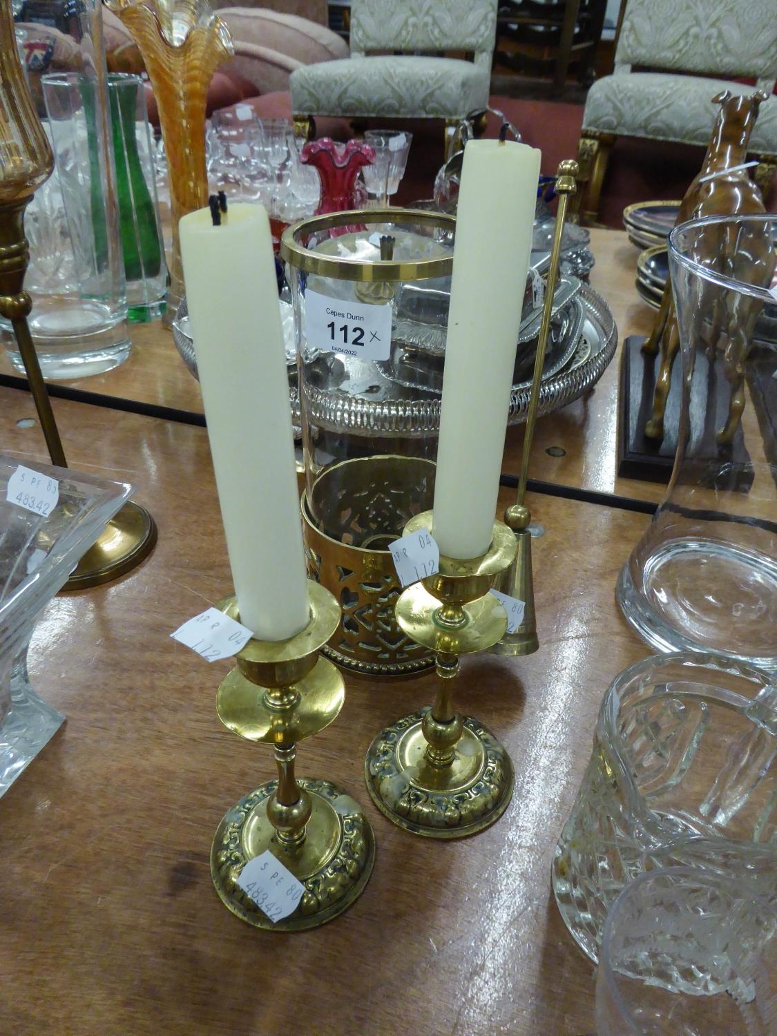 A BRASS PORTABLE CANDLE HOLDER WITH GLASS SHADE AND BRASS SNUFFER, A PAIR OF ARTS AND CRAFTS