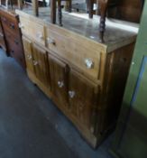 VINTAGE CONTINENTAL PINE DRESSER with two dep frieze drawers above four cupboard doors, fitted