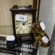 A QUARTZ MANTEL CLOCK, A SMALL CARVED WOOD DOG OF FO, TWO SMALL OWLS CARVED FROM COAL (4)