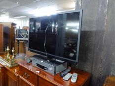 TOSHIBA FLAT SCREEN TELEVISION AND A VHS RECORDER/PLAYER (OLD TECHNOLOGY) (2)