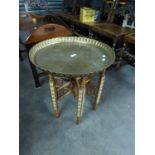 A PRE-WAR EGYPTIAN DECORATED CIRCULAR BRASS SCALLOPED EDGE TRAY, REMOVABLE FRAME, WOODEN BONE INLAID