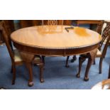 CHIPPENDALE STYLE MAHOGANY OVAL DINING TABLE, with gadroon carved edge, on four acanthus carved