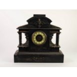 LATE VICTORIAN BLACK SLATE LARGE MANTLE CLOCK, the 4 ¼? Arabic dial with pierced gilt centre,