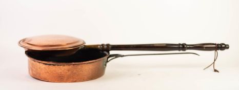 ANTIQUE COPPER SKILLET WITH SHORT CAST IRON HANDLE, 14? (35.6cm) diameter, lacking cover, together