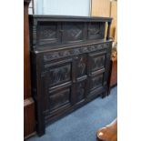 LATE 19th CENTURY/EARLY 20th CENTURY REPRODUCTION DARK STAINED PANELLED AND CARVED OAK COURT
