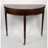 GEORGIAN STYLE LINE INLAID AND FIGURED MAHOGANY DEMI-LUNE CARD TABLE, the crossbanded top