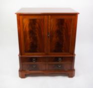 CHARLES BARR, GEORGIAN STYLE CHERRY AND FIGURED MAHOGANY TWO DOOR TELEVISION CABINET WITH FALL FRONT