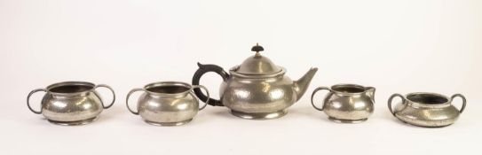 SOLKETS FOR LIBERTY LIMITED, ENGLISH and TUDRIC PEWTER THREE PIECE PLANISHED TEA SET, of bellied,