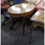 EDWARDIAN SATINWOOD OVAL OCCASIONAL TABLE, the quarter cut and crossbanded top above a conforming