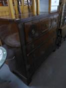 A LARGE MAHOGANY CHEST OF DRAWERS, HAVING THREE DEEP DRAWERS ABOVE THREE LONG DRAWERS, RAISED ON