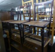 A SET OF THREE VICTORIAN BEDROOM SINGLE CHAIRS WITH CANE PANEL SEATS, TURNED LADDER RAIL BACKS AND