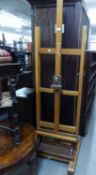 ADJUSTABLE BLOND WOOD ARTIST?S LARGE STUDIO EASEL, of typical form with end supports, 60 ½? high
