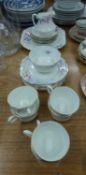 TWENTY ONE PIECE CRESCENT CHINA TEA SET FOR SIX PERSONS, with floral printed borders, including milk