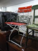 RED AND WHITE FOLDING GARDEN CHAIR and a FANCY GREEN PAINTED ALLOY PERIODICAL RACK, (2)