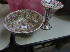 AN INTER-WAR YEARS CROWN DUCAL POTTERY BOWL AND AN ANYSLEY FLOWER RECEIVER WITH LOOSE PIERCED