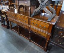 LATE 20TH CENTURY REPRODUCTION, POSSIBLY CHESTNUT, DRESSER BASE, WITH THREE DRAWERS ABOVE A SHAPED
