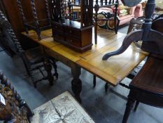 AN INTER-WAR YEARS WILLSELL PATENT OAK DRAW LEAF DINING TABLE, WITH BALUSTER TURNED SUPPORTS, 36?